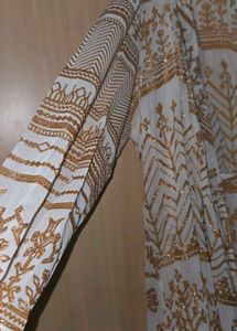 Green Embroidered Maxi Dress with golden jacket