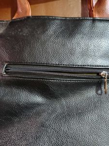 Black Leather Handbag with Brown Accents