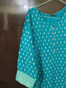 Ferozi blue jacketed kurta with beautiful print