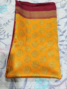 Vibrant Yellow Saree with Peacock Motif