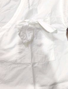 Cream Cropped V-Neck Top with Bow Pocket