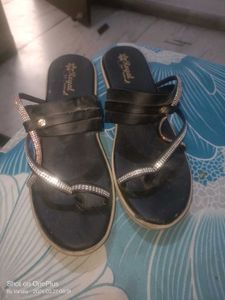black rhinestone sandal or heel