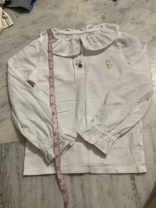 girls white ruffle top