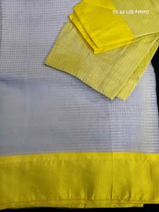 Elegant White Saree with Yellow Border