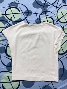 white baby tee