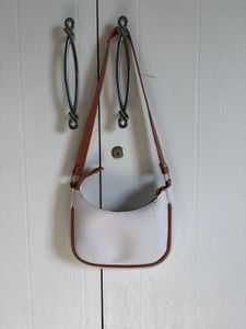 Chic White Hobo Bag with Brown Trim