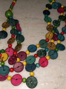 button beaded long necklace