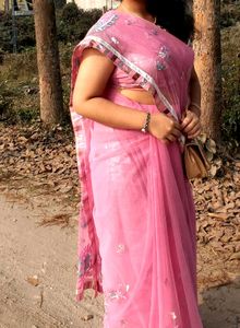 Elegant Pink Saree with Delicate Details