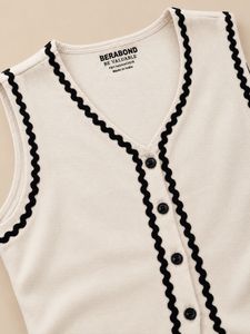 Cream Sleeveless Top with Black Trim