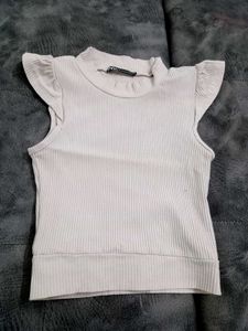 Ribbed Mock Neck Flutter Sleeve Top