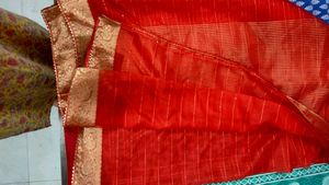 Elegant Red organza zari bordered Saree