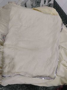Elegant Cream Kurta Set with Intricate Embellishme