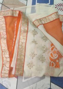 Embroidered Cream &amp; Orange Saree