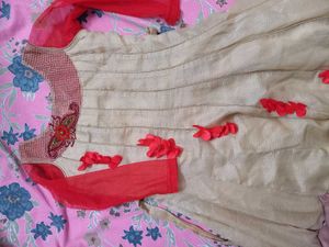 Elegant Beige Kurta with Red Accents