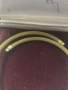 Elegant Gold Necklace with Textured Beads