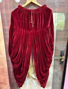 Men’s white sherwani with red velvet dhoti