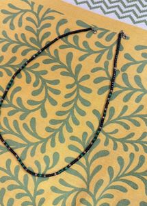 Black Beaded Necklace with Green Accents
