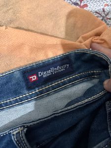 Distressed Blue Denim Jeans