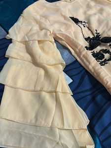 Elegant Peach Kurta with Floral Embroidery