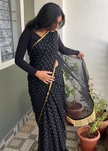 Black Saree With Golden Booty