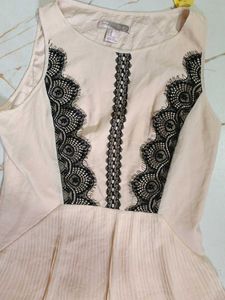 Elegant Beige High-Low Dress with Black Lace