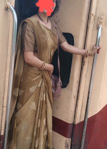 Elegant Brown Saree with Leaf Print