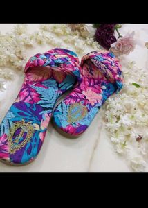 multicolored textured flats