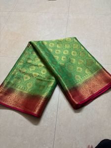 Green Silk Saree with Gold Border