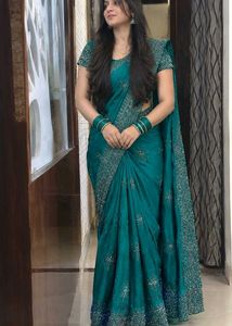 Stunning Teal Embellished Saree