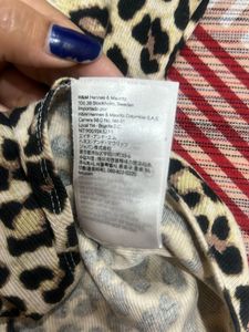 Leopard design top high neck