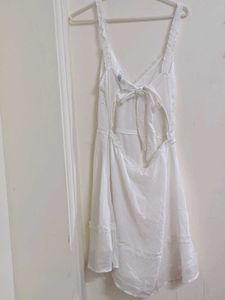 White mini tie back dress