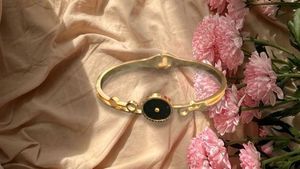 Elegant Gold Tone Black Stone Bangle