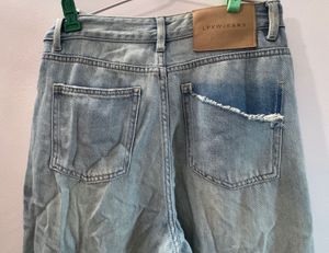 Light Wash Ripped Wide Leg Jeans