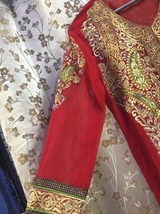 Festive wear red Pakistani suit with chudidar pant