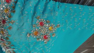 Stunning Embroidered Teal Saree