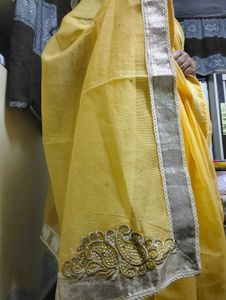 Vibrant Yellow Saree with paisley motifs