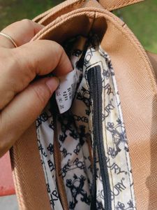 Roxbury brown sling bag