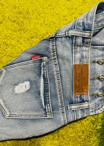 Distressed Denim Shorts with Embellishments