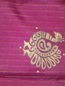 Elegant Maroon Striped Saree with Peacock Motifs