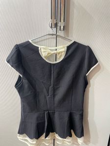 Chic Black Dress with Bow Detail