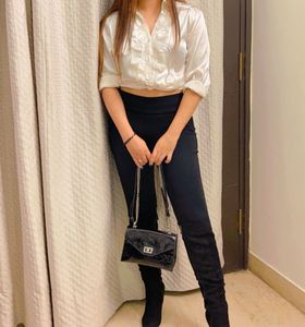 Elegant White Ruffled Satin Shirt