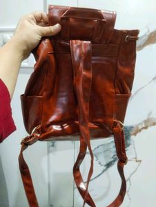 Brown leather backpack