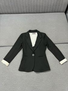 Classic Black Blazer with Polka Dot Lining