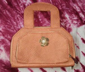 Chic Rose Gold Clutch with Pearl Accent