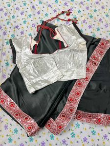 Elegant Black Saree with Red Border