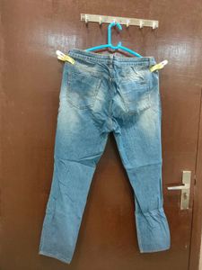 Distressed Blue Denim Jeans