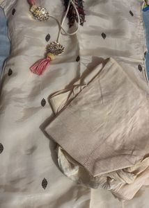 Elegant Cream Kurta Set with Tassels