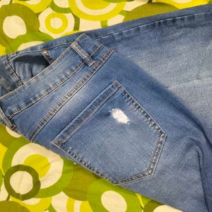 Distressed Blue Flare Jeans