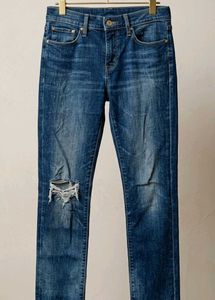 Distressed Blue Denim Jeans