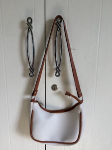 Chic White Hobo Bag with Brown Trim